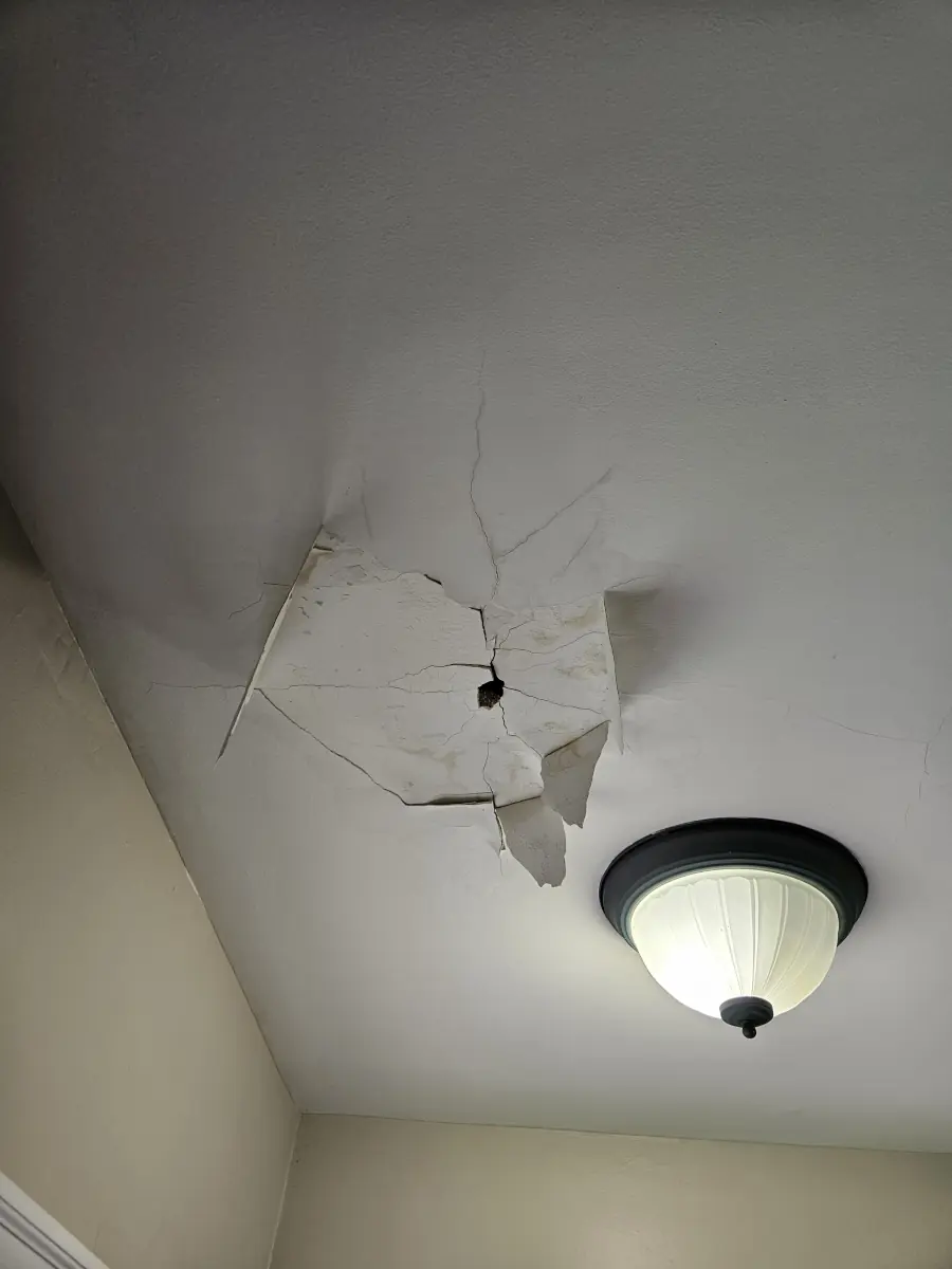 Damaged ceiling — before