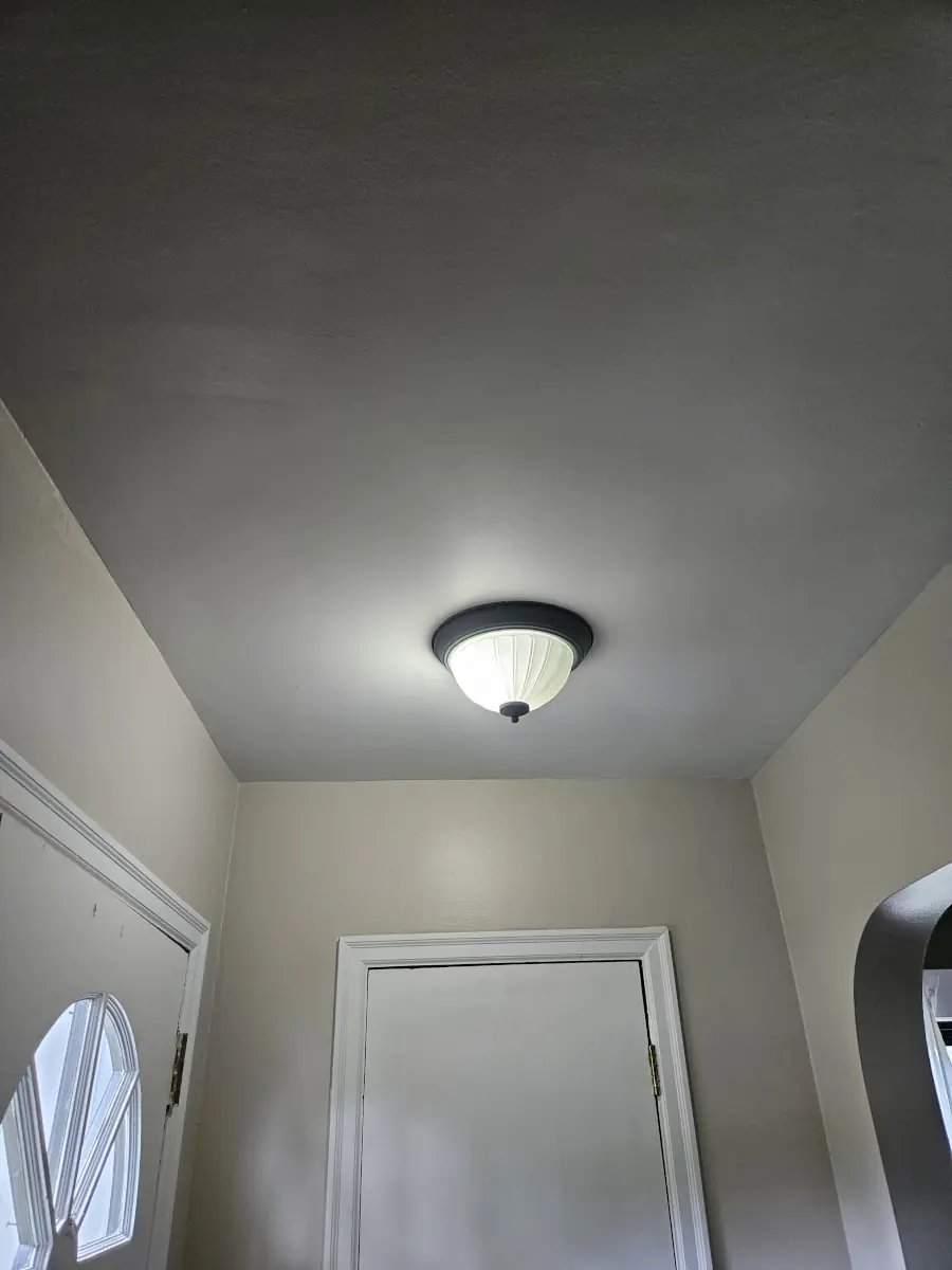 Repaired and painted ceiling — after